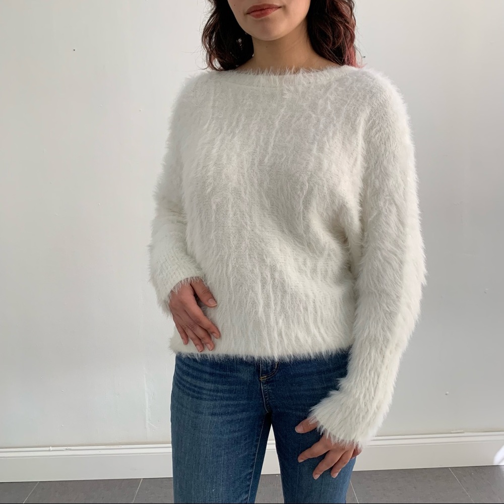 Wearing your heart on your sleeve white sweater